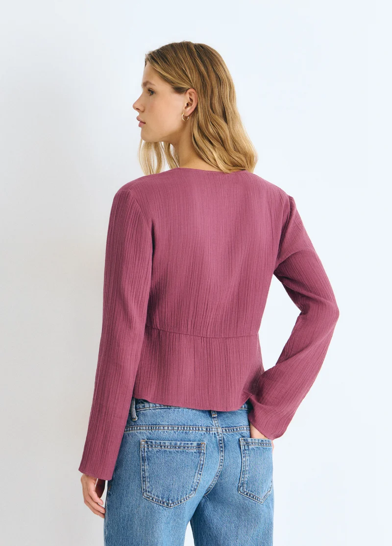 Long-sleeve studded blouse