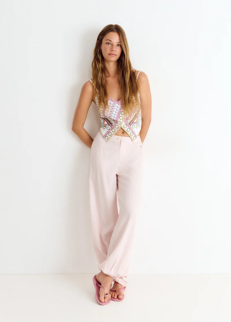 Embroidered strap top