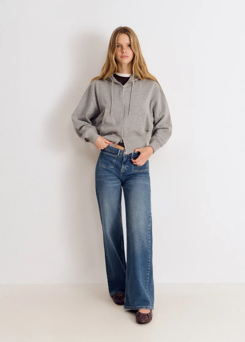 Embroidered front-pocket jeans