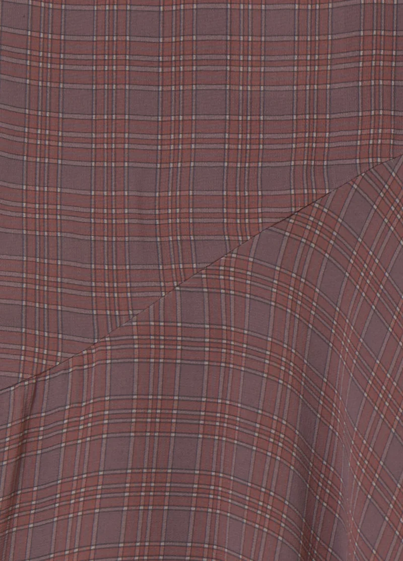 Long plaid skirt with an asymmetric hem