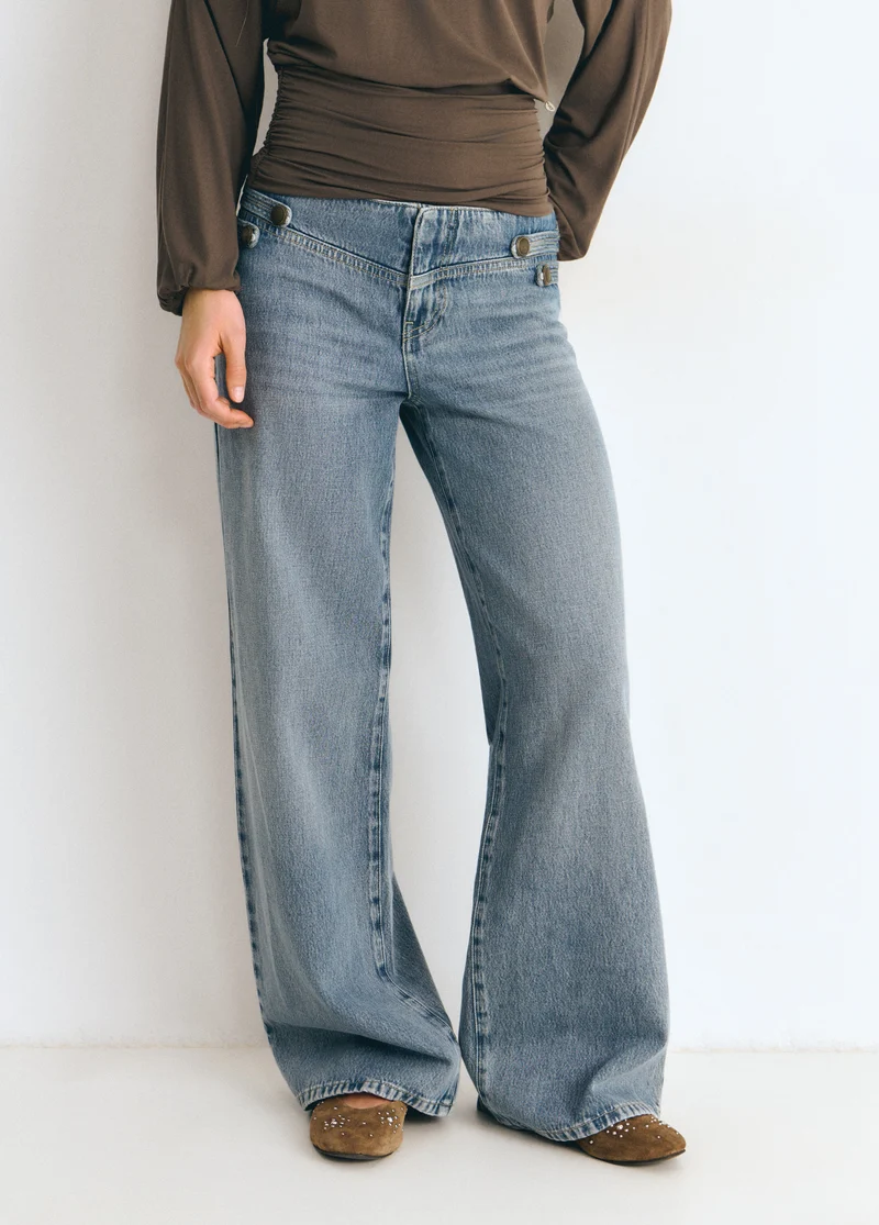Denim with military-style button details