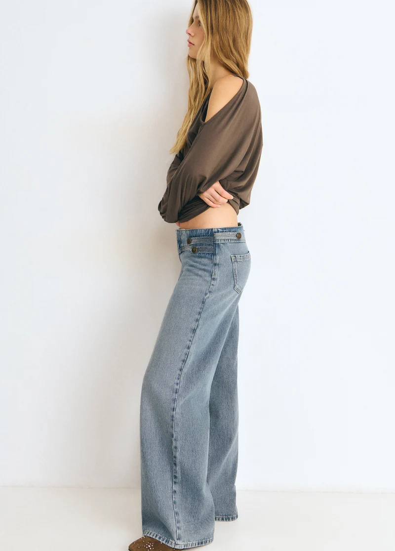 Denim with military-style button details