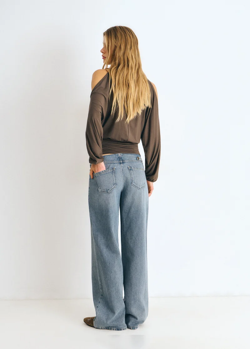 Denim with military-style button details