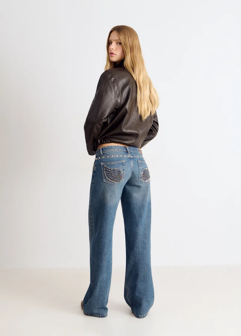 Straight-leg jeans with embroidered wings