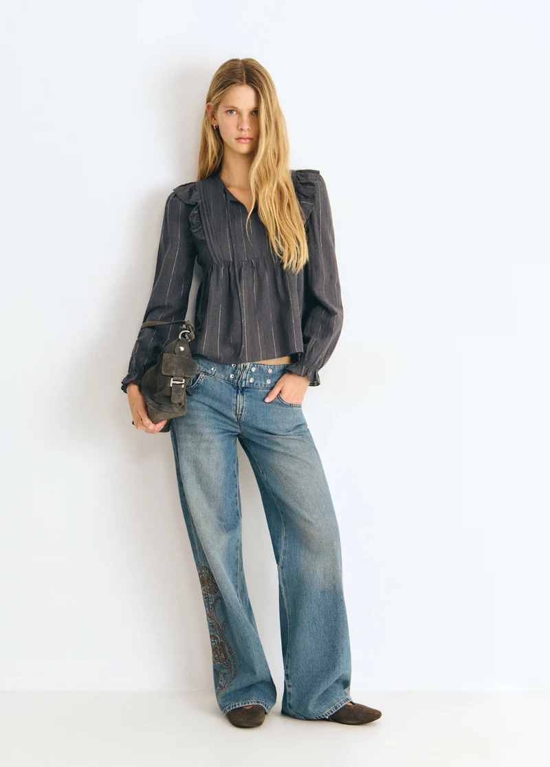 Blouse with ruffle detail and lurex stripe
