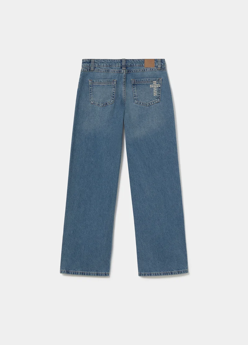 Cross-studded jeans