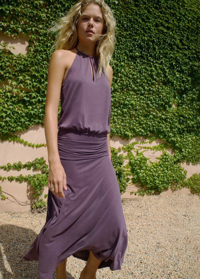 Low-cut studded dress