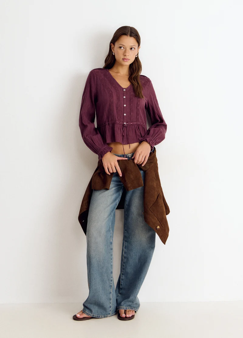 Long-sleeved ruffle blouse
