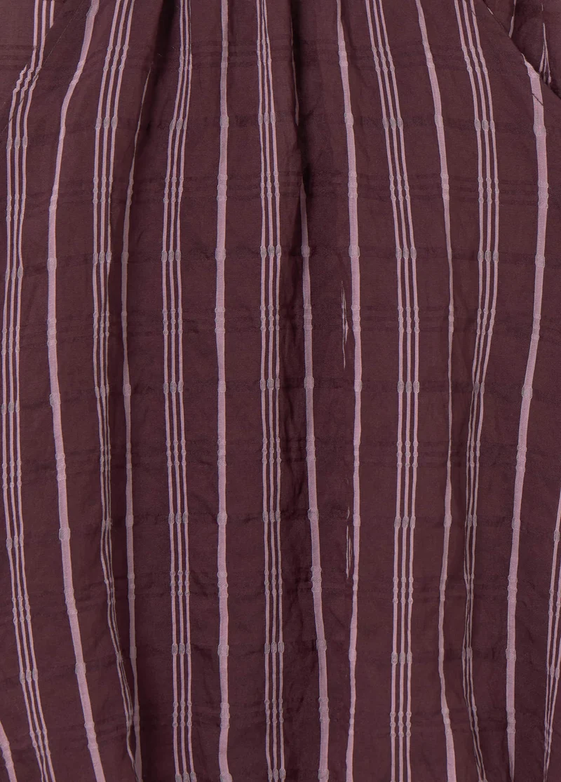 Long-sleeved striped cut-out blouse