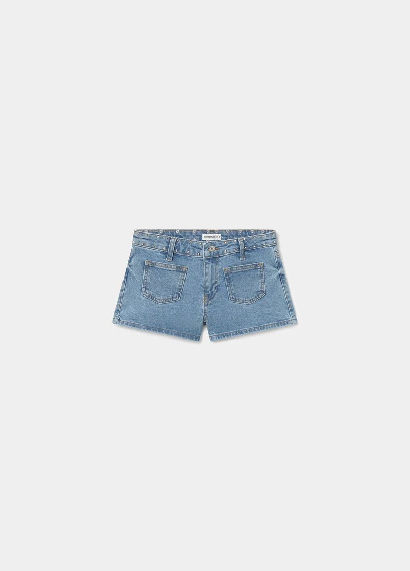 Studded shorts with star patch