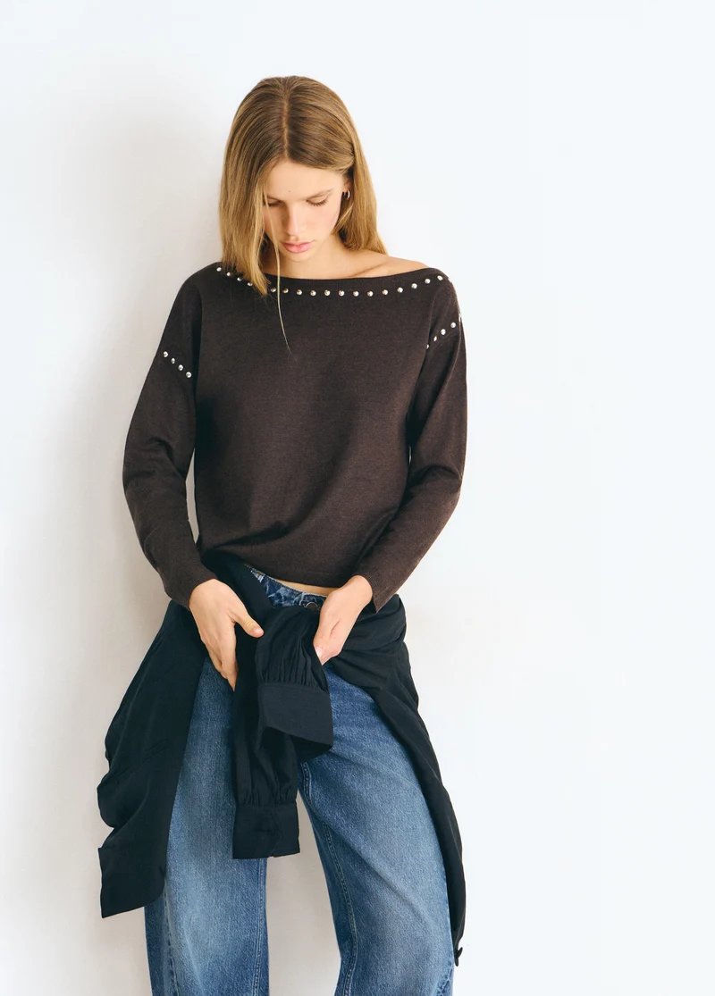 Asymmetric studded sweater
