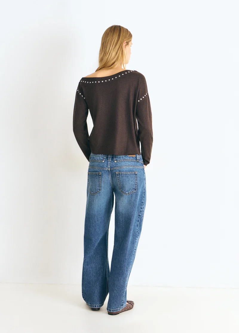 Asymmetric studded sweater