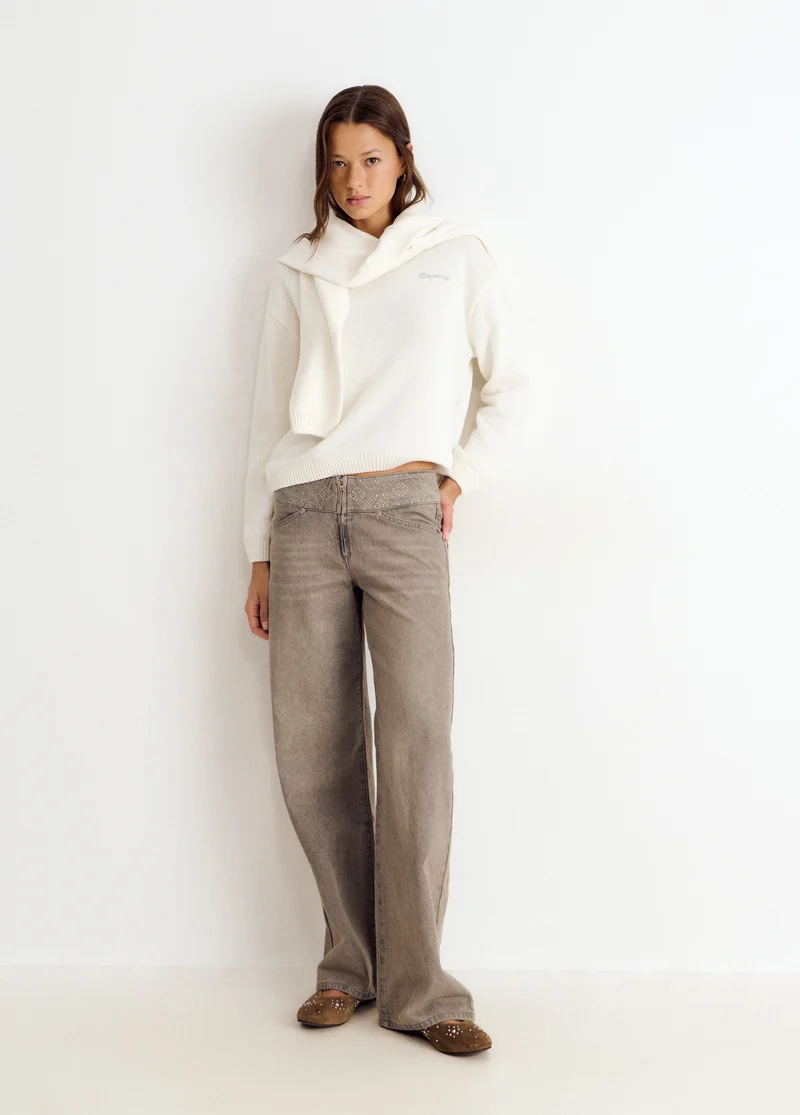 Wing studded back sweater