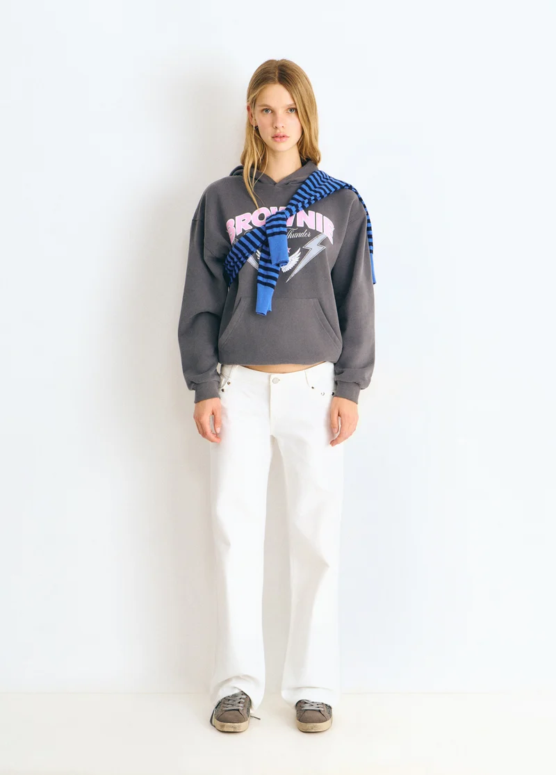 Low-rise pants with glitter stars and studs