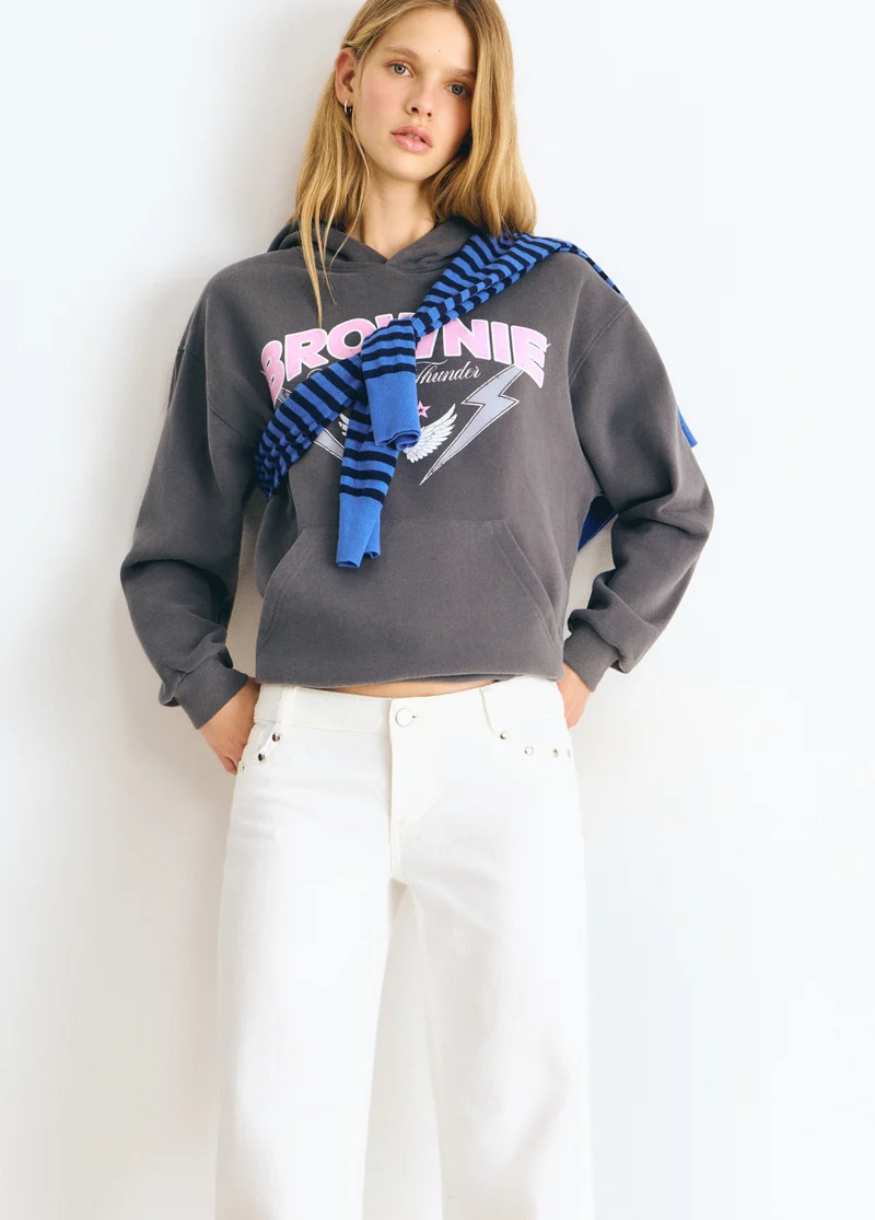 Low-rise pants with glitter stars and studs
