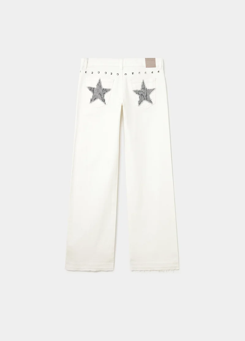 Low-rise pants with glitter stars and studs