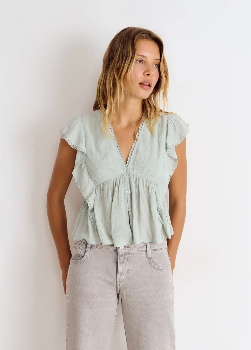 Romantic blouse with ruffles and lace trim