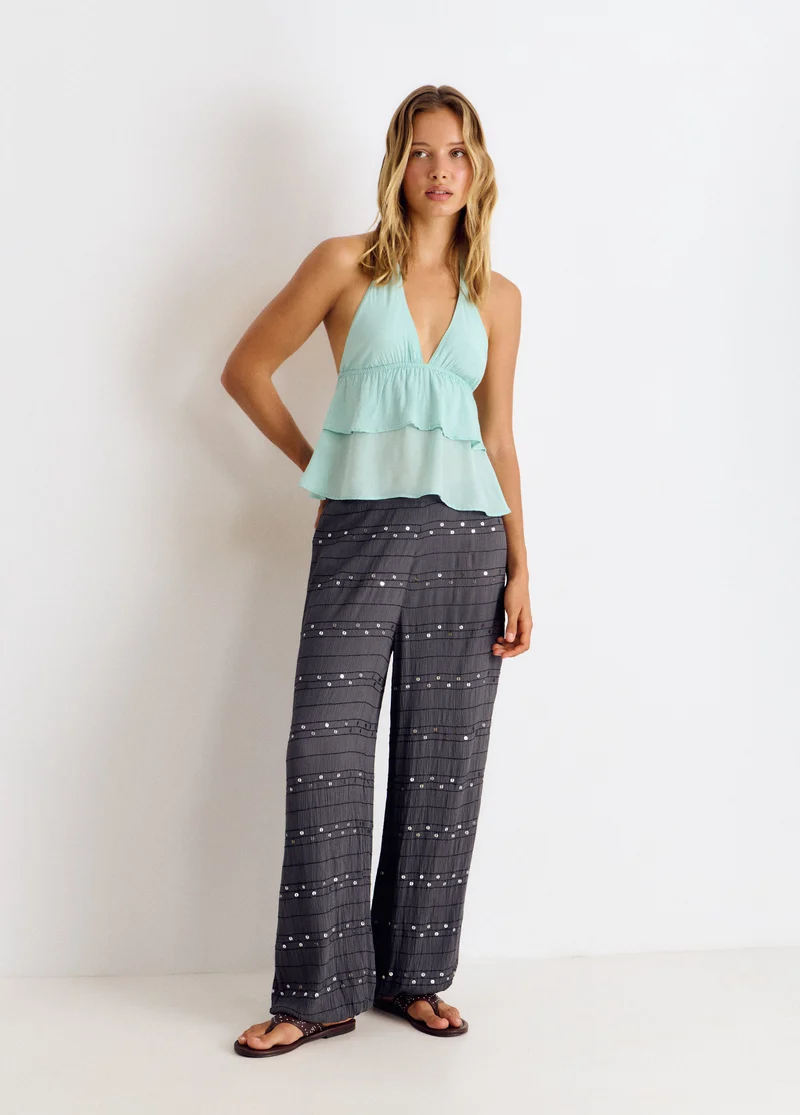 Ruffled strap top