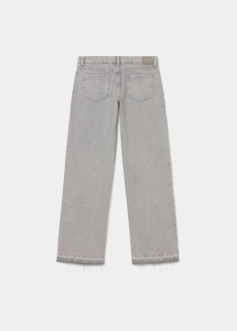 Jeans with side studs