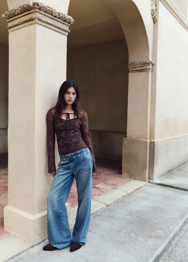 Studded embroidered waistband jeans