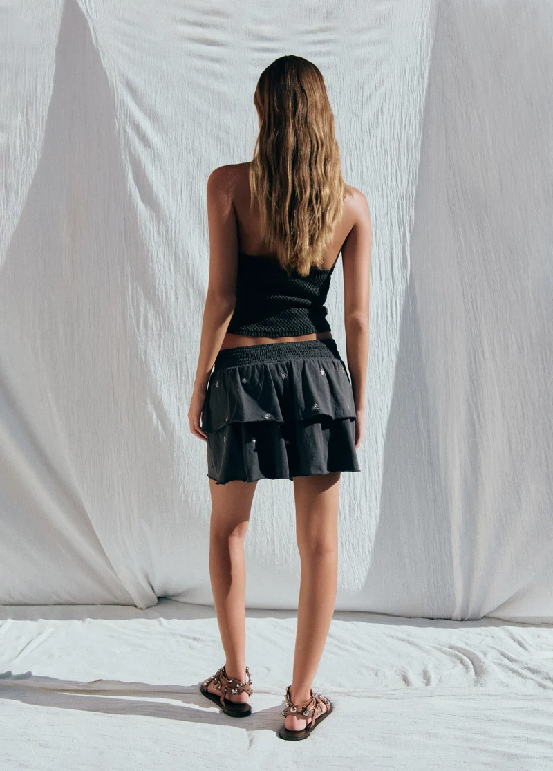 Smocked skirt with embroidery