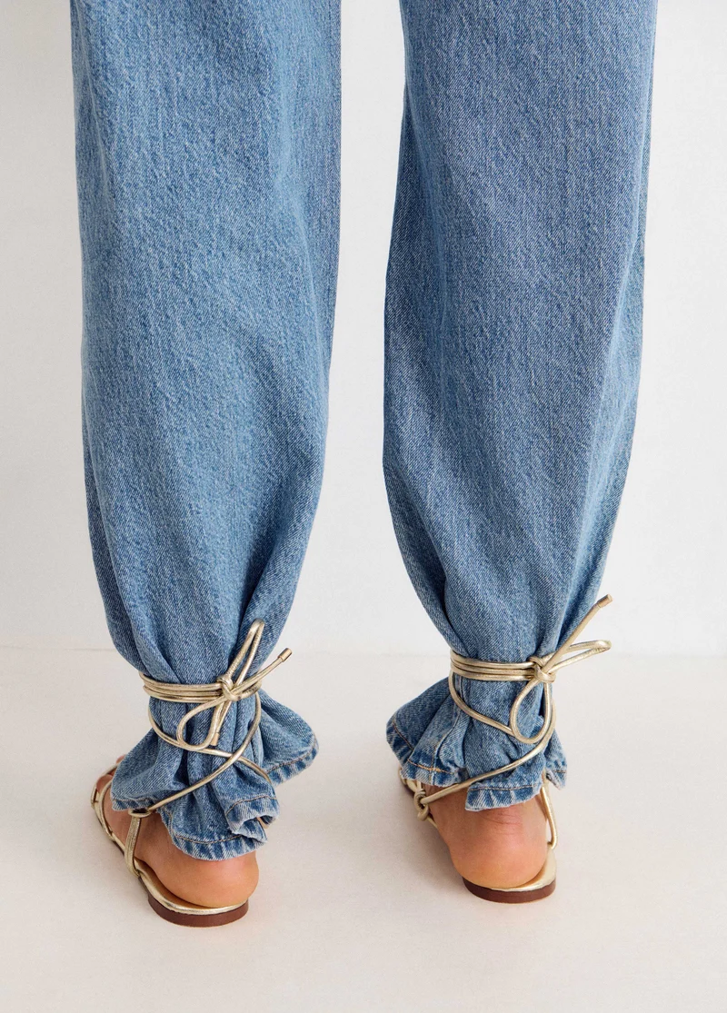 Flat sandals with tied straps