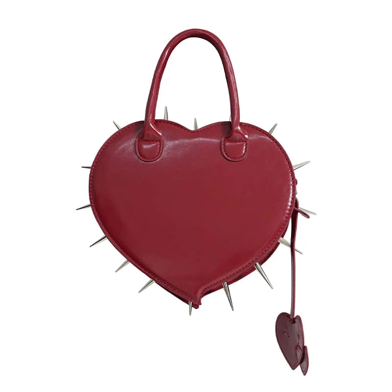 Rote gotische Damenhandtasche mit Pentagramm, Stacheln und herzförmigem Muster