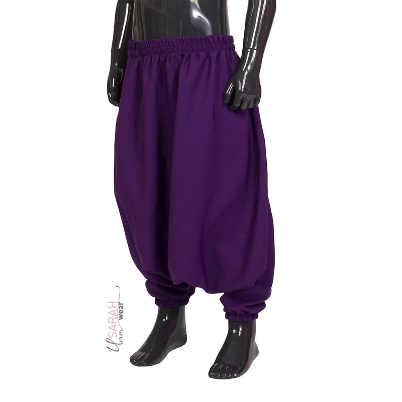 Lilafarbener Rock und Hose für Mädchen