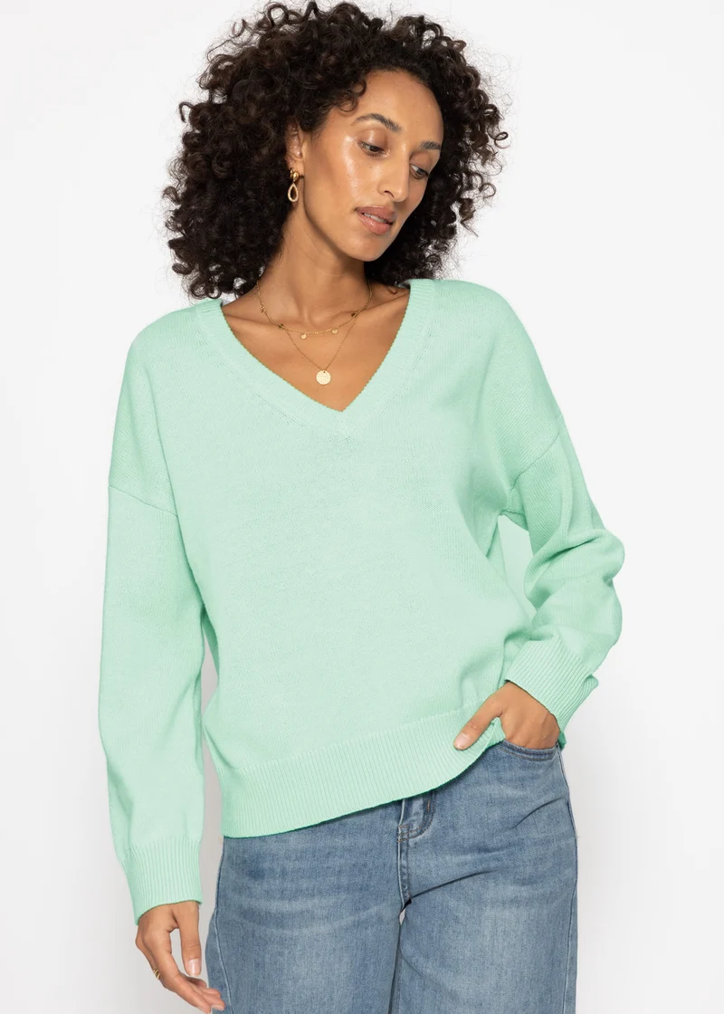 Oversize Baumwoll-Pullover mit tiefem V-Ausschnitt - mint