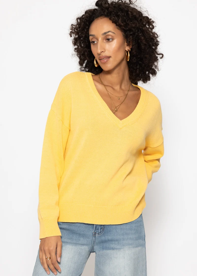 Oversize Baumwoll-Pullover mit tiefem V-Ausschnitt - gelb
