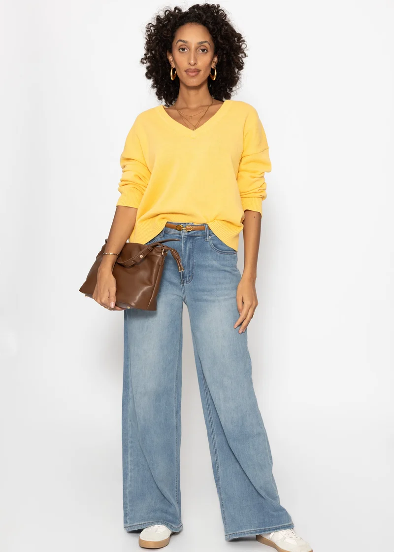 Oversize Baumwoll-Pullover mit tiefem V-Ausschnitt - gelb